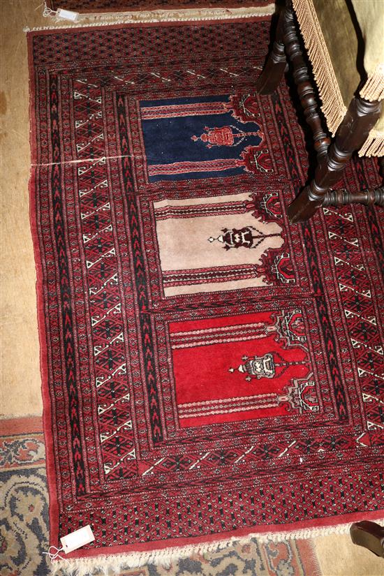 Red ground prayer rug